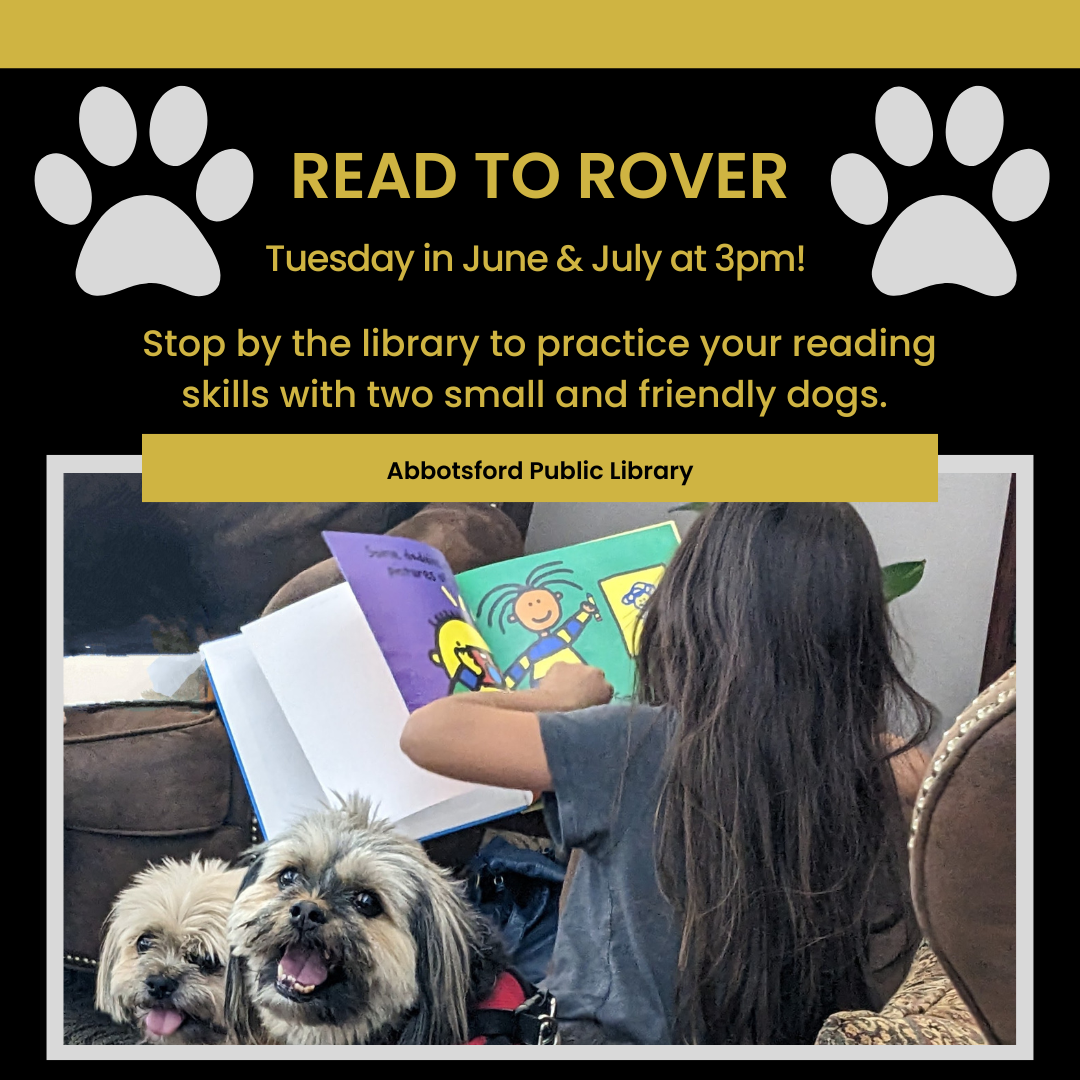 Picture of a child reading to two small dogs.